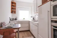 Bonquartier | Modern apartment with workspaces, terrace & parking space Hotels in Hennef