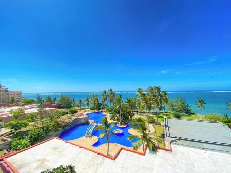 Nate's Homes & Suites Отели в г. Шансу