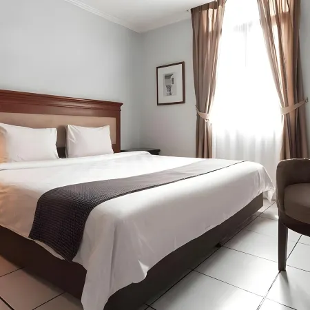 Travellers Suites Serviced Apartments