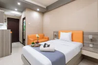 Calming Wooden Touch Studio Room At Apartment Soekarno Hatta (Suhat) Malang - Apartments