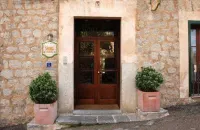 Hotel y Apartamentos des Puig Hôtels à : Deia