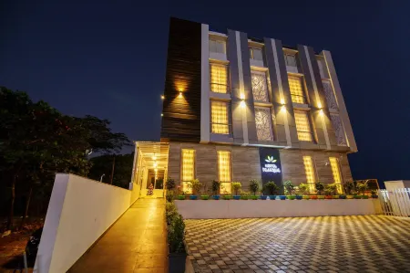 Hotel Tranquil Manipal Отели рядом с достопримечательностью «Botany Garden (Botanica)»
