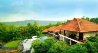 Athirapally Green Trees Hotels near Athirappilly Waterfalls Bottom View Point
