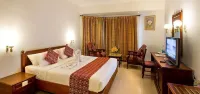 Krishna Inn Hotels near Machamangalath Bhagawathi Temple