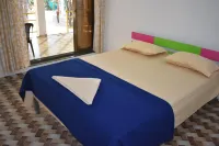 Coconut Garden Beach House Hotels in Devbag