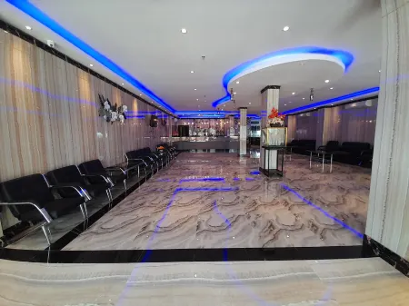 Puncak MG Hotel Отели в г. Bukitintan