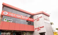 Treebo Elite Plaza, 700 Mtrs from Madikeri Fort - parking