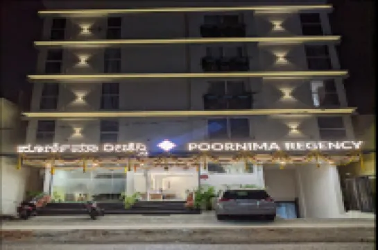 Poornima Regency Hotels near Lalbagh Botanical Garden