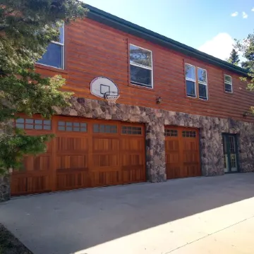 Location! Nice log home in dark sky community next to several peaks