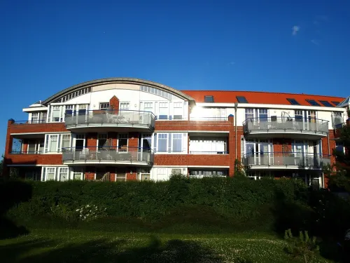 Modern vacation apartment with direct view of the North Sea and swimming pool