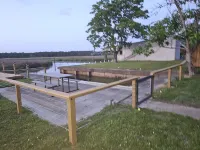 HotTub/Fish/RIVER FRONT/DOGS/SUMMER POOL.RIGHT BY GULF AND BEACHES. BRING BOAT!