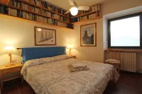 Two-room apartment in Residence with swimming pool and panoramic lake view in Sale Marasino