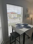 Cozy Apartment with resort style pool and 5 minute walk to the beach!