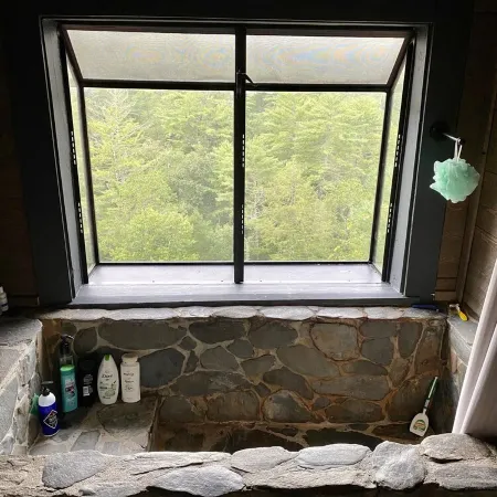 Private Mountain View cabin on 5 acres, great patio with creek below back patio.
