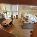Cozy cottage that sits along canal of Sandy Pond.