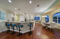Coastal Elegance: Retreat with Heated Pool, Golf Cart, and Entertainment Haven