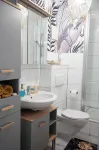Modern 1-room apartment near the train station, newly renovated, top furnishings