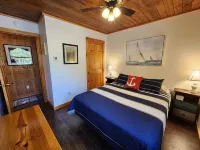 Lakefront w/ large deck, screened porch, dock, private lakefront. Pet friendly!