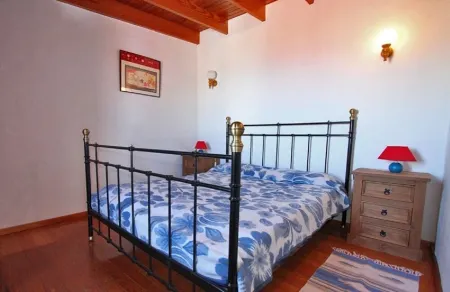 Semi-detached holiday home with pool and sea views