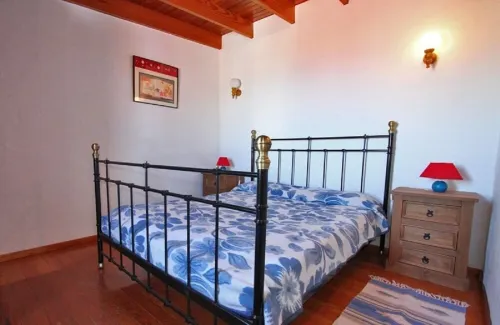 Semi-detached holiday home with pool and sea views