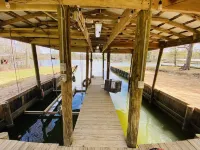 Little Minnow is a Pet friendly water front home on Toledo Bend in a quiet cove.