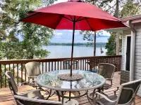 Relax in a cozy and private lake front cabin with breathtaking views!