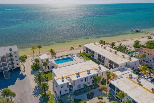 BEACHFRONT CONDO on Coco Plum Beach with Heated Pool