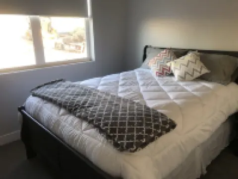 Blue Lake Retreat - fully-landscaped home sits on 2nd tee of Bear Lake G.C.