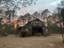 Waterfront Cabin off I-95 in Lumberton with WiFi, Foosball, Kayaks, Pet-friendly