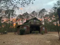 Waterfront Cabin off I-95 in Lumberton with WiFi, Foosball, Kayaks, Pet-friendly