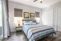 Newer Home on Lake June with Beach, Dock, Screened Patio and Hot Tub!