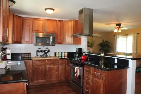 Open Heated Pool Home with 2 car garage