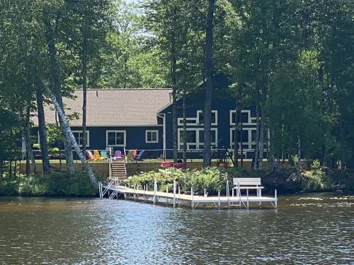 Luxury Eagle River Chain Home- Trail access, Free Firewood, & High Speed WIFI!