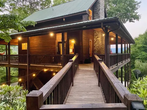 Private Cabin with  Mountain Views, Fire Pit, Wraparound Deck, and Game Room!