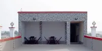 Amuzu Hotel Hoteles en Tema