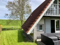 Joke am Deich 6 Pers House with Equipped Terrace Behind a Dike at Lauwersmeer