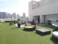 Elite 47 Hotel & Suites Hotels near Arcos Bosques Tower