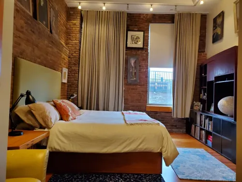 2 story Penthouse with incredible light, 26' ceilings & great outdoor space