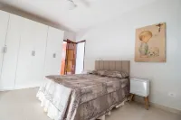 Best location in Caraguá with pool - 5 bedrooms - Up to 20 people Hotels near Cocanha Beach