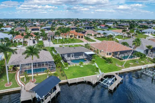 Poolside Oasis w/ Boat Dock! Cape Coral Retreat - parking