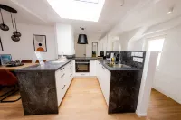 Highlight in Mühldorf - Come4stay Stadtblick - 2 Zimmer Wohnung I bis zu 4 Gäste Hotels in Muhldorf