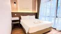 Cottonhouz, KK Times Square by Ayuhouz - New