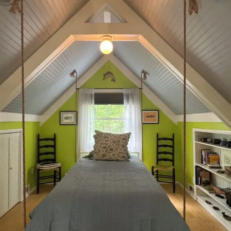 The Blue Cottage located in the woods on Lookout Mountain in Rising Fawn GA