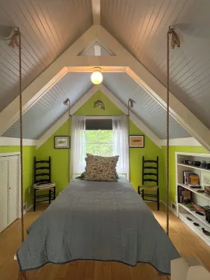 The Blue Cottage located in the woods on Lookout Mountain in Rising Fawn GA