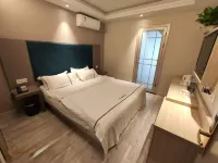 Linquan Aixin Hotel