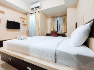 Cozy Studio Room Grand Dhika Apartment by Travelio