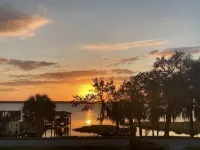 Watch Florida sunsets from the covered lakefront dock Hotels in Minneola