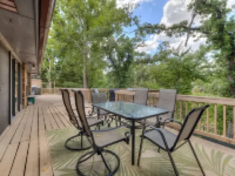 Quiet, spacious home with large deck in secluded Forest Oaks in central Edmond .