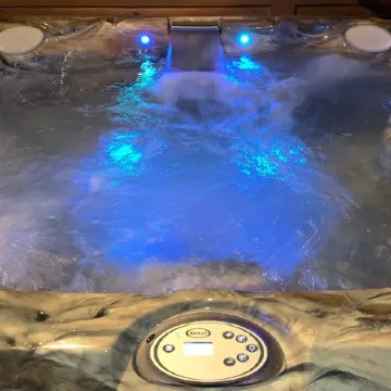 Spacious Log Cabin with Hot Tub, Fire Pit, Large Decks & Wood Fireplace