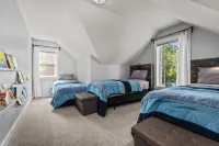 Family Friendly lake home, beach, level lot, fire pit, game room, dog friendly!